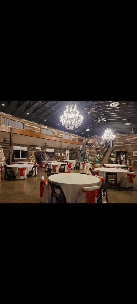 Christmas-wedding, high-end-event-space, industrial-chic-ballroom, grand-chandelier-lighting, luxury-wedding-reception